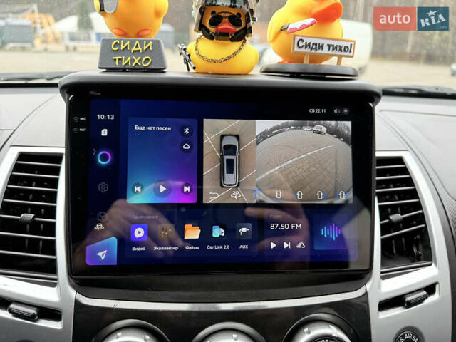 Білий Міцубісі Паджеро Спорт, об'ємом двигуна 2.48 л та пробігом 230 тис. км за 13500 $, фото 36 на Automoto.ua