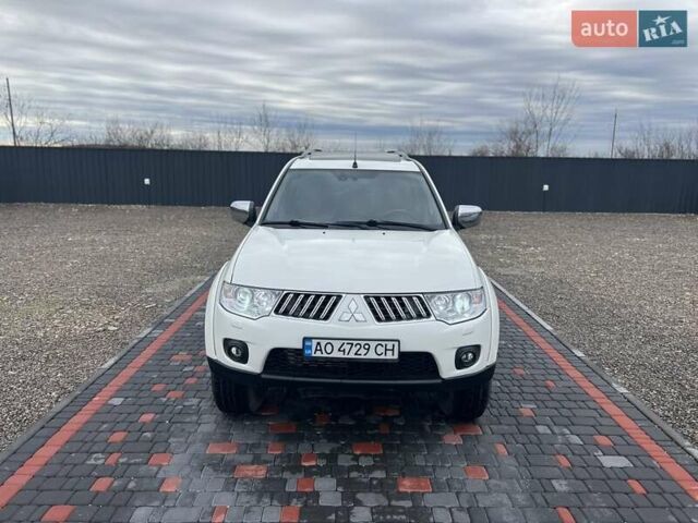 Білий Міцубісі Паджеро Спорт, об'ємом двигуна 2.5 л та пробігом 158 тис. км за 13200 $, фото 14 на Automoto.ua