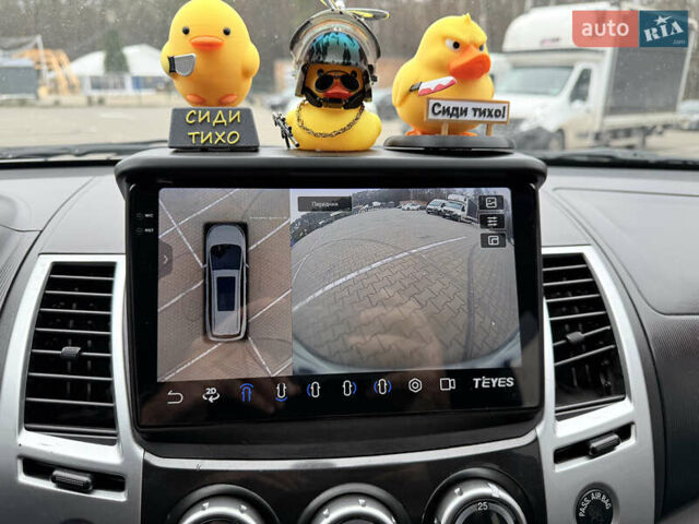 Білий Міцубісі Паджеро Спорт, об'ємом двигуна 2.48 л та пробігом 230 тис. км за 13500 $, фото 29 на Automoto.ua