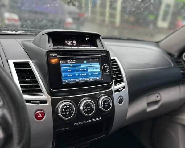 Білий Міцубісі Паджеро Спорт, об'ємом двигуна 2.48 л та пробігом 161 тис. км за 17900 $, фото 3 на Automoto.ua