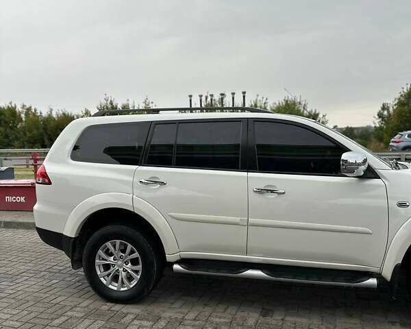 Білий Міцубісі Паджеро Спорт, об'ємом двигуна 2.48 л та пробігом 161 тис. км за 17900 $, фото 19 на Automoto.ua