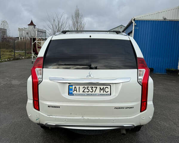 Белый Мицубиси Паджеро Спорт, объемом двигателя 2.4 л и пробегом 290 тыс. км за 16300 $, фото 3 на Automoto.ua