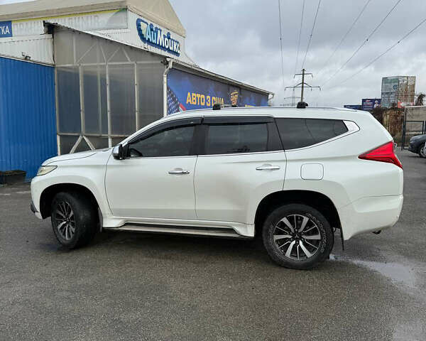 Белый Мицубиси Паджеро Спорт, объемом двигателя 2.4 л и пробегом 290 тыс. км за 16300 $, фото 5 на Automoto.ua