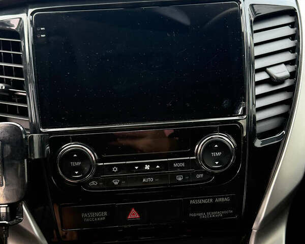 Белый Мицубиси Паджеро Спорт, объемом двигателя 2.4 л и пробегом 290 тыс. км за 16300 $, фото 8 на Automoto.ua