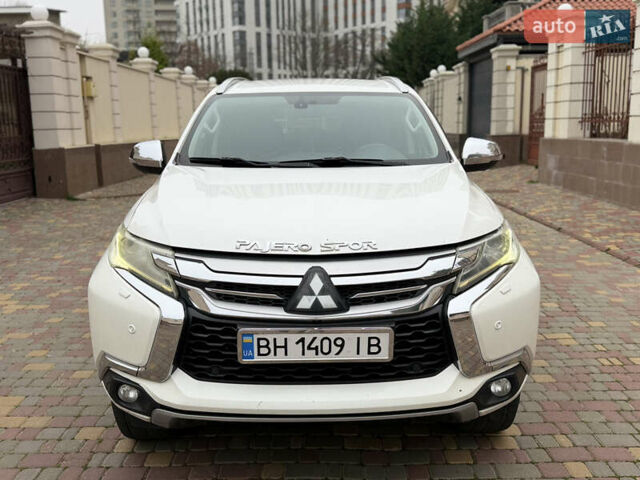 Белый Мицубиси Паджеро Спорт, объемом двигателя 2.44 л и пробегом 188 тыс. км за 16500 $, фото 1 на Automoto.ua