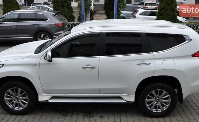 Белый Мицубиси Паджеро Спорт, объемом двигателя 2.44 л и пробегом 38 тыс. км за 26400 $, фото 2 на Automoto.ua