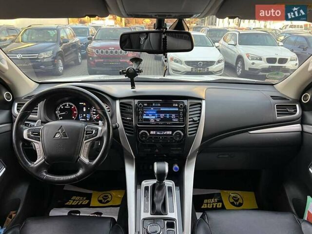 Білий Міцубісі Паджеро Спорт, об'ємом двигуна 2.44 л та пробігом 206 тис. км за 22000 $, фото 8 на Automoto.ua