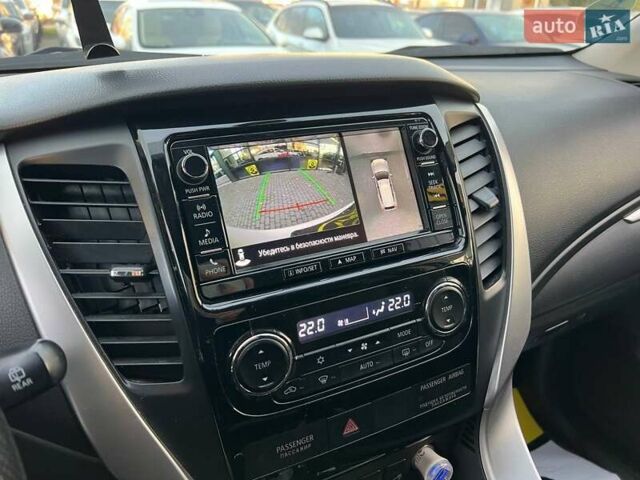 Білий Міцубісі Паджеро Спорт, об'ємом двигуна 2.44 л та пробігом 206 тис. км за 22000 $, фото 18 на Automoto.ua