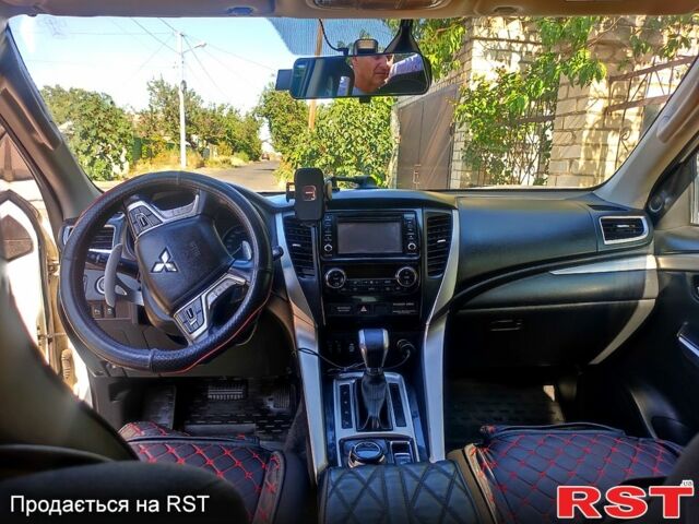 Белый Мицубиси Паджеро Спорт, объемом двигателя 2.4 л и пробегом 72 тыс. км за 24000 $, фото 3 на Automoto.ua