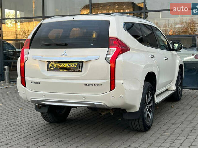 Білий Міцубісі Паджеро Спорт, об'ємом двигуна 2.44 л та пробігом 206 тис. км за 22000 $, фото 5 на Automoto.ua