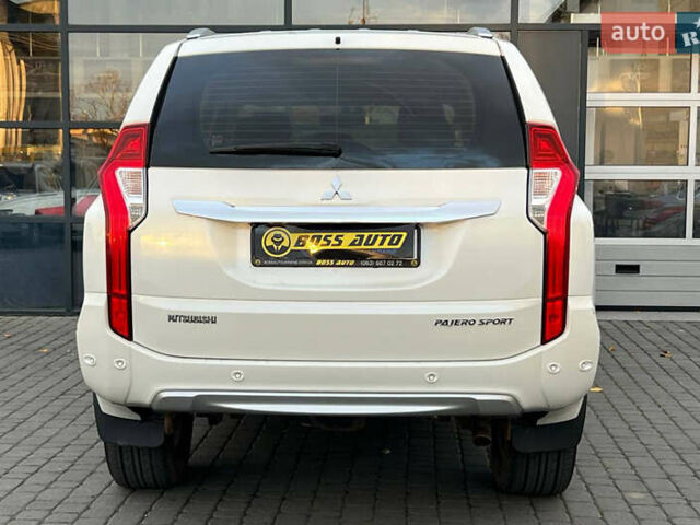 Білий Міцубісі Паджеро Спорт, об'ємом двигуна 2.44 л та пробігом 206 тис. км за 22000 $, фото 4 на Automoto.ua