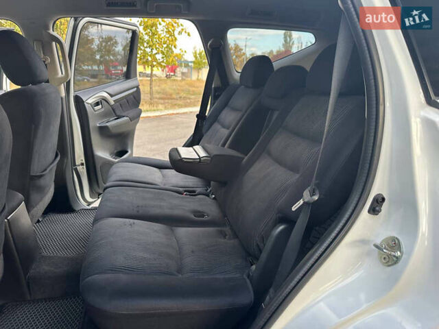 Білий Міцубісі Паджеро Спорт, об'ємом двигуна 2.44 л та пробігом 176 тис. км за 19900 $, фото 19 на Automoto.ua