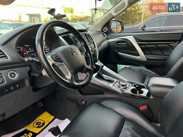 Білий Міцубісі Паджеро Спорт, об'ємом двигуна 2.44 л та пробігом 206 тис. км за 22000 $, фото 13 на Automoto.ua