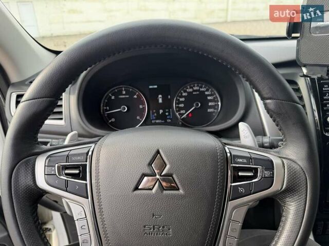 Білий Міцубісі Паджеро Спорт, об'ємом двигуна 2.44 л та пробігом 72 тис. км за 23900 $, фото 32 на Automoto.ua