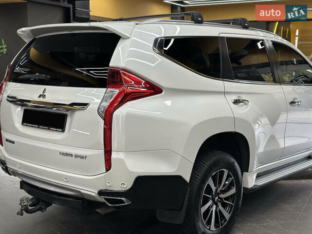 Білий Міцубісі Паджеро Спорт, об'ємом двигуна 2.44 л та пробігом 168 тис. км за 28999 $, фото 7 на Automoto.ua
