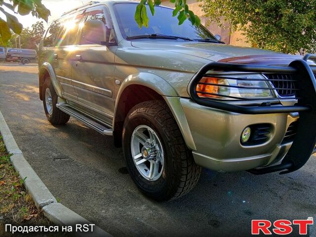 Бежевый Мицубиси Паджеро Спорт, объемом двигателя 3 л и пробегом 237 тыс. км за 8800 $, фото 2 на Automoto.ua