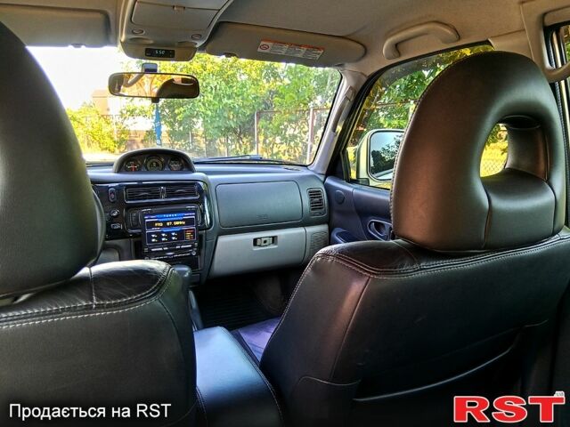 Бежевый Мицубиси Паджеро Спорт, объемом двигателя 3 л и пробегом 237 тыс. км за 8800 $, фото 4 на Automoto.ua