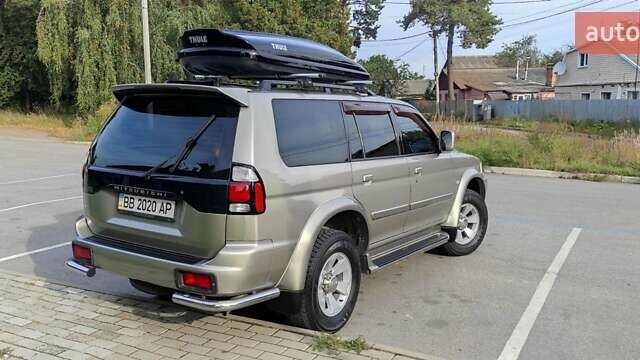 Бежевий Міцубісі Паджеро Спорт, об'ємом двигуна 3 л та пробігом 181 тис. км за 9400 $, фото 7 на Automoto.ua