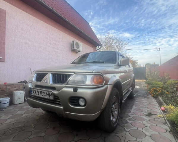 Бежевий Міцубісі Паджеро Спорт, об'ємом двигуна 3 л та пробігом 270 тис. км за 8300 $, фото 15 на Automoto.ua