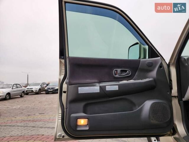 Бежевий Міцубісі Паджеро Спорт, об'ємом двигуна 2.5 л та пробігом 143 тис. км за 10800 $, фото 10 на Automoto.ua