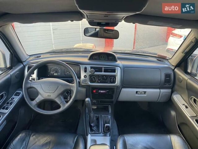 Бежевый Мицубиси Паджеро Спорт, объемом двигателя 2.48 л и пробегом 239 тыс. км за 10500 $, фото 14 на Automoto.ua