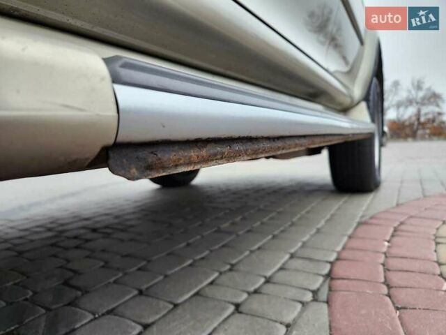 Бежевий Міцубісі Паджеро Спорт, об'ємом двигуна 2.5 л та пробігом 143 тис. км за 10800 $, фото 23 на Automoto.ua