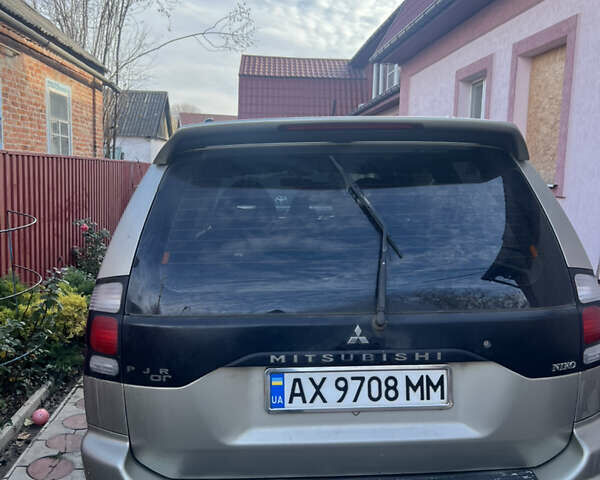 Бежевий Міцубісі Паджеро Спорт, об'ємом двигуна 3 л та пробігом 270 тис. км за 8300 $, фото 5 на Automoto.ua