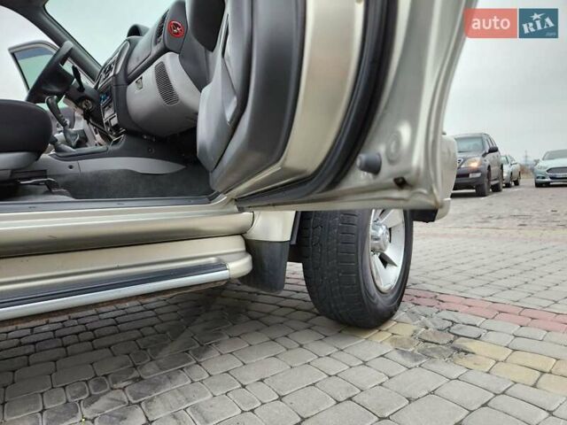 Бежевий Міцубісі Паджеро Спорт, об'ємом двигуна 2.5 л та пробігом 143 тис. км за 10800 $, фото 18 на Automoto.ua