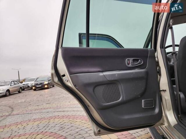 Бежевий Міцубісі Паджеро Спорт, об'ємом двигуна 2.5 л та пробігом 143 тис. км за 10800 $, фото 15 на Automoto.ua