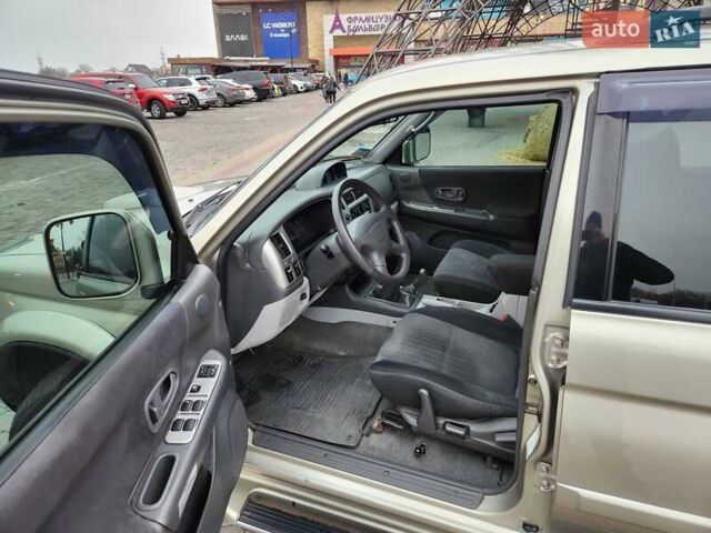 Бежевий Міцубісі Паджеро Спорт, об'ємом двигуна 2.5 л та пробігом 143 тис. км за 10800 $, фото 6 на Automoto.ua