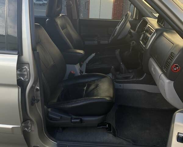 Бежевый Мицубиси Паджеро Спорт, объемом двигателя 2.48 л и пробегом 239 тыс. км за 10500 $, фото 10 на Automoto.ua