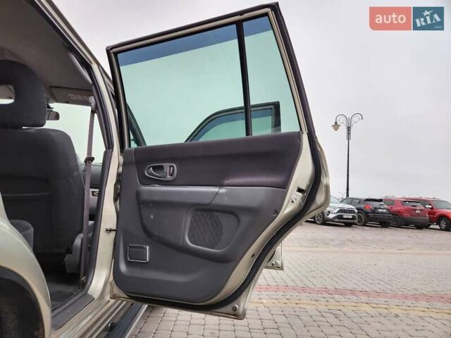 Бежевий Міцубісі Паджеро Спорт, об'ємом двигуна 2.5 л та пробігом 143 тис. км за 10800 $, фото 19 на Automoto.ua