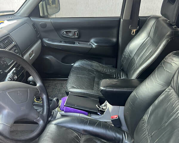 Бежевий Міцубісі Паджеро Спорт, об'ємом двигуна 3 л та пробігом 270 тис. км за 8300 $, фото 9 на Automoto.ua