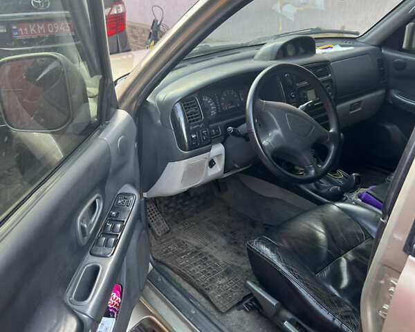 Бежевий Міцубісі Паджеро Спорт, об'ємом двигуна 3 л та пробігом 270 тис. км за 8300 $, фото 8 на Automoto.ua