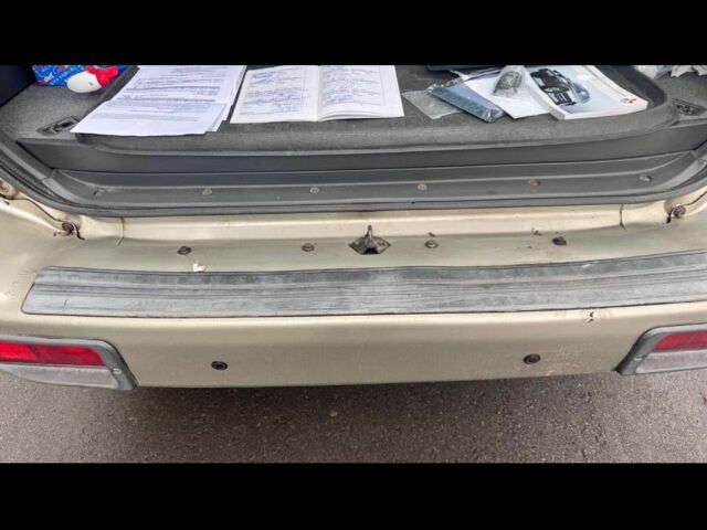 Бежевий Міцубісі Паджеро Спорт, об'ємом двигуна 2.5 л та пробігом 180 тис. км за 13000 $, фото 4 на Automoto.ua