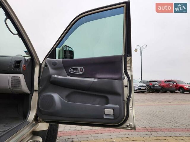 Бежевий Міцубісі Паджеро Спорт, об'ємом двигуна 2.5 л та пробігом 143 тис. км за 10800 $, фото 11 на Automoto.ua
