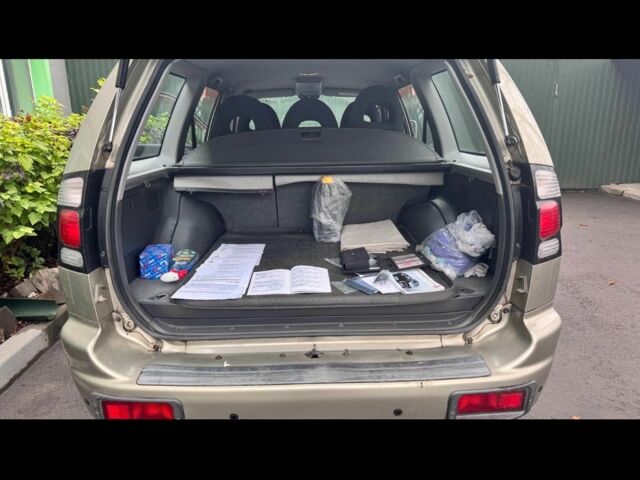 Бежевий Міцубісі Паджеро Спорт, об'ємом двигуна 2.5 л та пробігом 180 тис. км за 13000 $, фото 6 на Automoto.ua