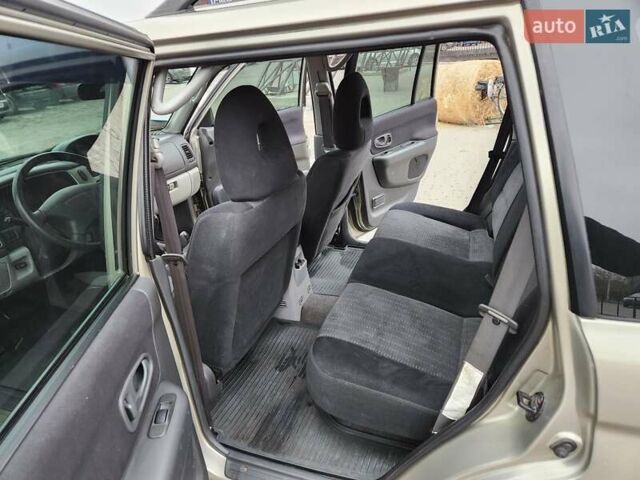 Бежевий Міцубісі Паджеро Спорт, об'ємом двигуна 2.5 л та пробігом 143 тис. км за 10800 $, фото 13 на Automoto.ua