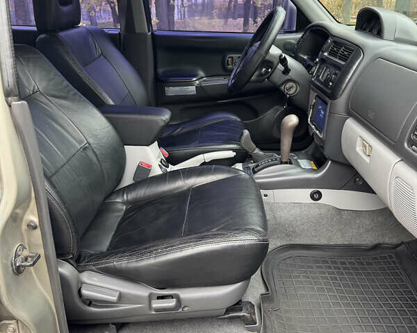 Бежевый Мицубиси Паджеро Спорт, объемом двигателя 3 л и пробегом 220 тыс. км за 8800 $, фото 13 на Automoto.ua