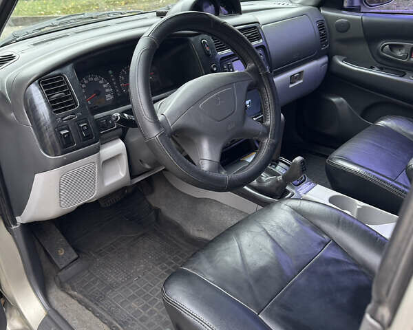 Бежевый Мицубиси Паджеро Спорт, объемом двигателя 3 л и пробегом 220 тыс. км за 8800 $, фото 10 на Automoto.ua