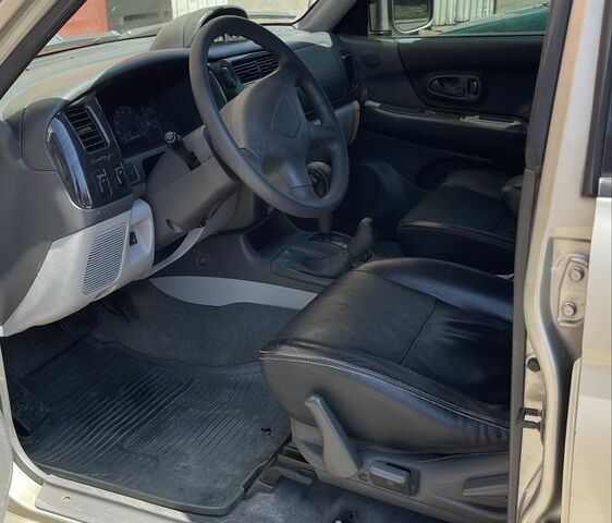 Бежевый Мицубиси Паджеро Спорт, объемом двигателя 3 л и пробегом 290 тыс. км за 7200 $, фото 5 на Automoto.ua