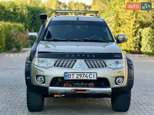 Бежевий Міцубісі Паджеро Спорт, об'ємом двигуна 2.48 л та пробігом 200 тис. км за 14900 $, фото 11 на Automoto.ua