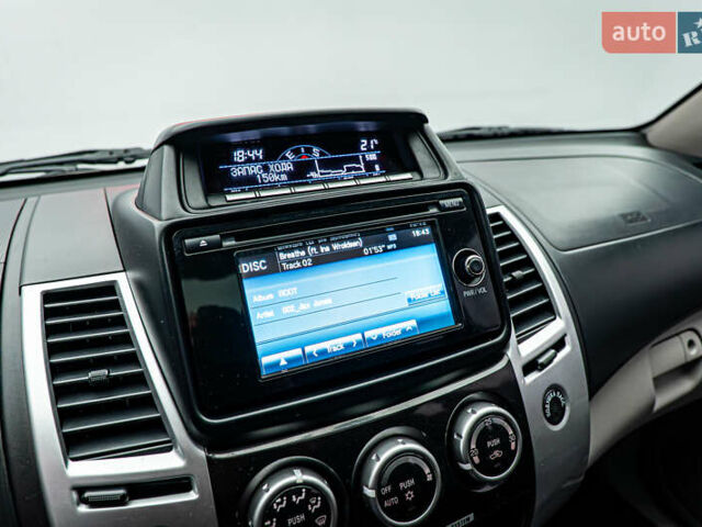 Бежевий Міцубісі Паджеро Спорт, об'ємом двигуна 2.5 л та пробігом 170 тис. км за 17331 $, фото 15 на Automoto.ua