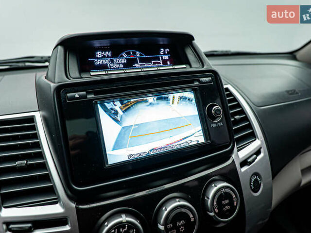 Бежевий Міцубісі Паджеро Спорт, об'ємом двигуна 2.5 л та пробігом 170 тис. км за 17331 $, фото 16 на Automoto.ua