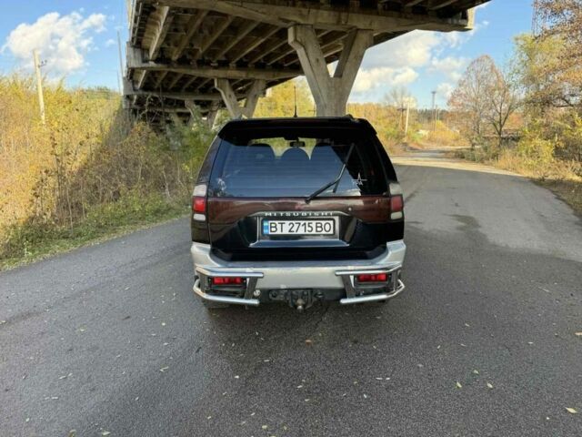 Черный Мицубиси Паджеро Спорт, объемом двигателя 3 л и пробегом 293 тыс. км за 4599 $, фото 3 на Automoto.ua