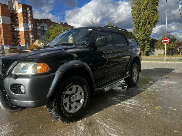 Черный Мицубиси Паджеро Спорт, объемом двигателя 3 л и пробегом 400 тыс. км за 6500 $, фото 2 на Automoto.ua