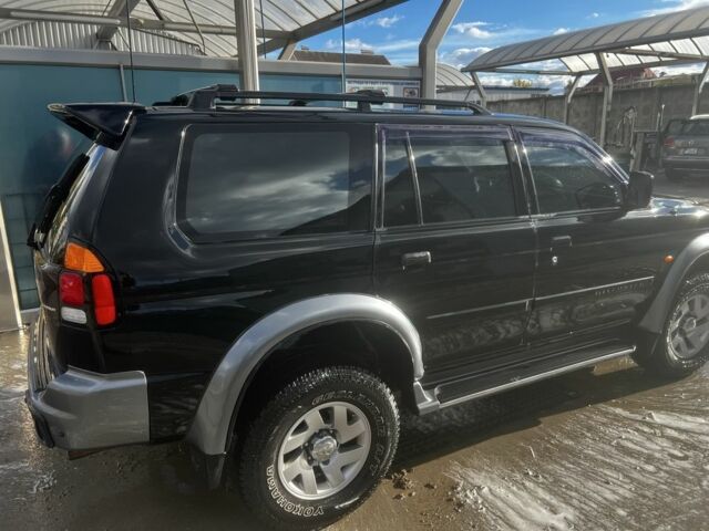 Черный Мицубиси Паджеро Спорт, объемом двигателя 3 л и пробегом 400 тыс. км за 6500 $, фото 4 на Automoto.ua