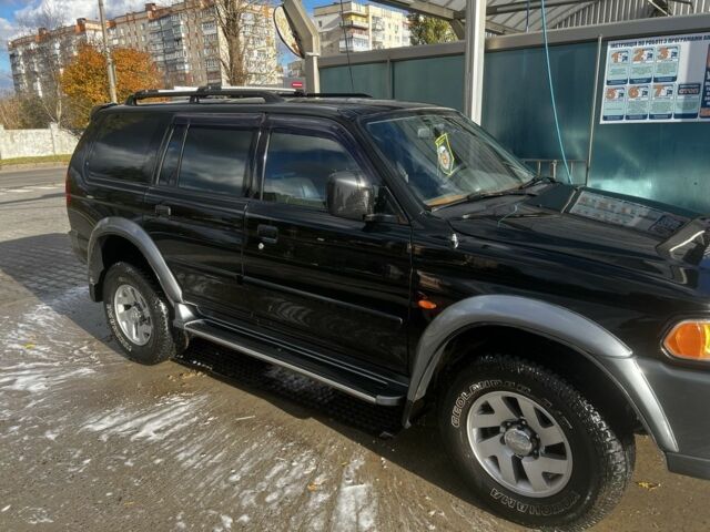Черный Мицубиси Паджеро Спорт, объемом двигателя 3 л и пробегом 400 тыс. км за 6500 $, фото 5 на Automoto.ua