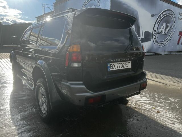 Черный Мицубиси Паджеро Спорт, объемом двигателя 3 л и пробегом 400 тыс. км за 6500 $, фото 1 на Automoto.ua