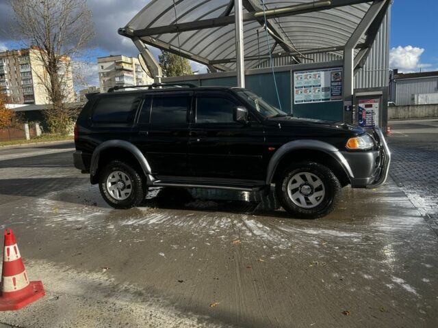 Черный Мицубиси Паджеро Спорт, объемом двигателя 3 л и пробегом 400 тыс. км за 6500 $, фото 3 на Automoto.ua